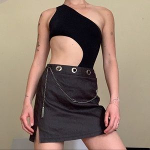 Grey skirt with circular metal detailing